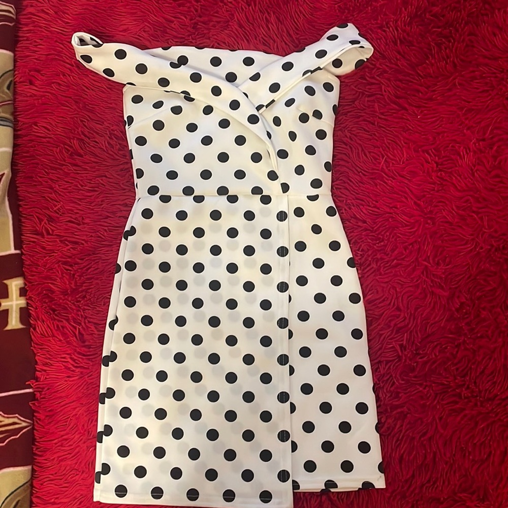 A short black and white polkadot dress